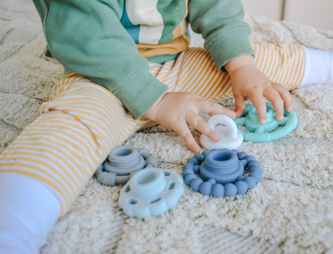Rainbow Stacker is the ultimate multi-purpose toy, your child will quickly discover how the stacking rings make the best soothing teethers. Available from www.thecollectivenz.com