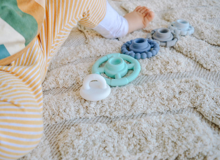 Rainbow Stacker is the ultimate multi-purpose toy, your child will quickly discover how the stacking rings make the best soothing teethers. Available from www.thecollectivenz.com