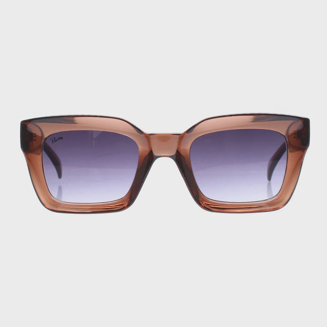 Oversized square sunglasses with a translucent amber-brown frame and gradient purple lenses, shown against a light gray background.