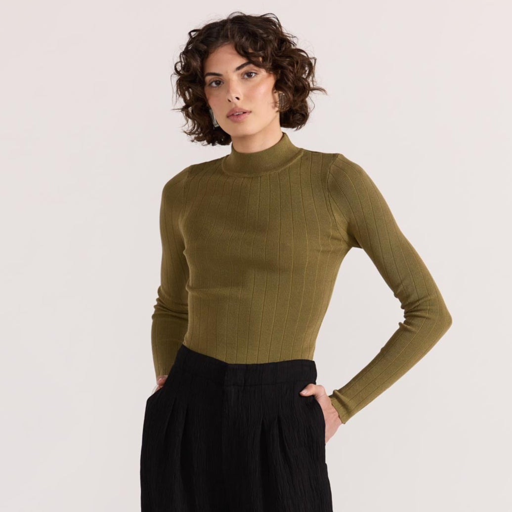 The Renee Rib Knit Top by Staple the Label is a timeless wardrobe essential. Featuring a fitted silhouette, and stretchy rib knit fabrication.  Available from www.thecollectivenz.com