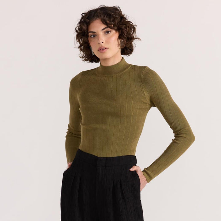 The Renee Rib Knit Top by Staple the Label is a timeless wardrobe essential. Featuring a fitted silhouette, and stretchy rib knit fabrication.  Available from www.thecollectivenz.com