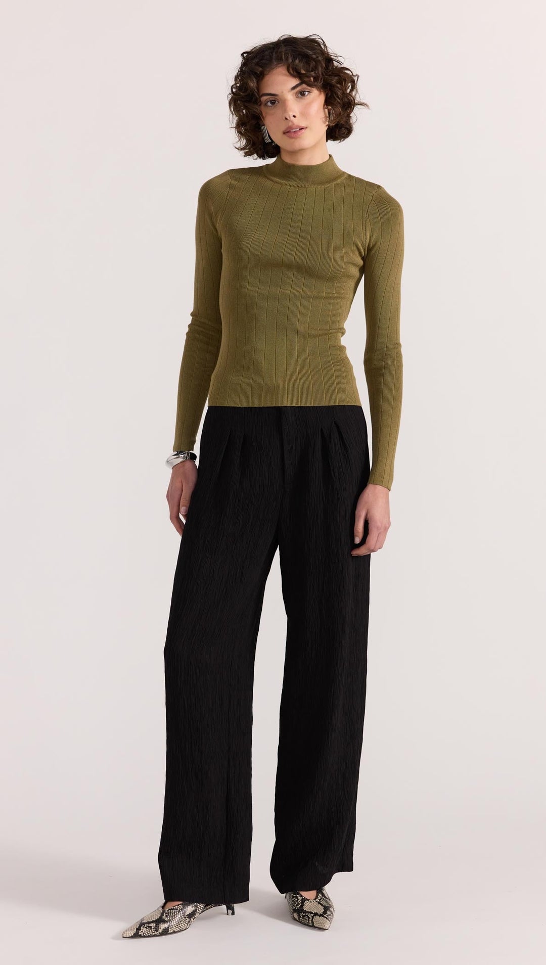 The Renee Rib Knit Top by Staple the Label is a timeless wardrobe essential. Featuring a fitted silhouette, and stretchy rib knit fabrication.  Available from www.thecollectivenz.com