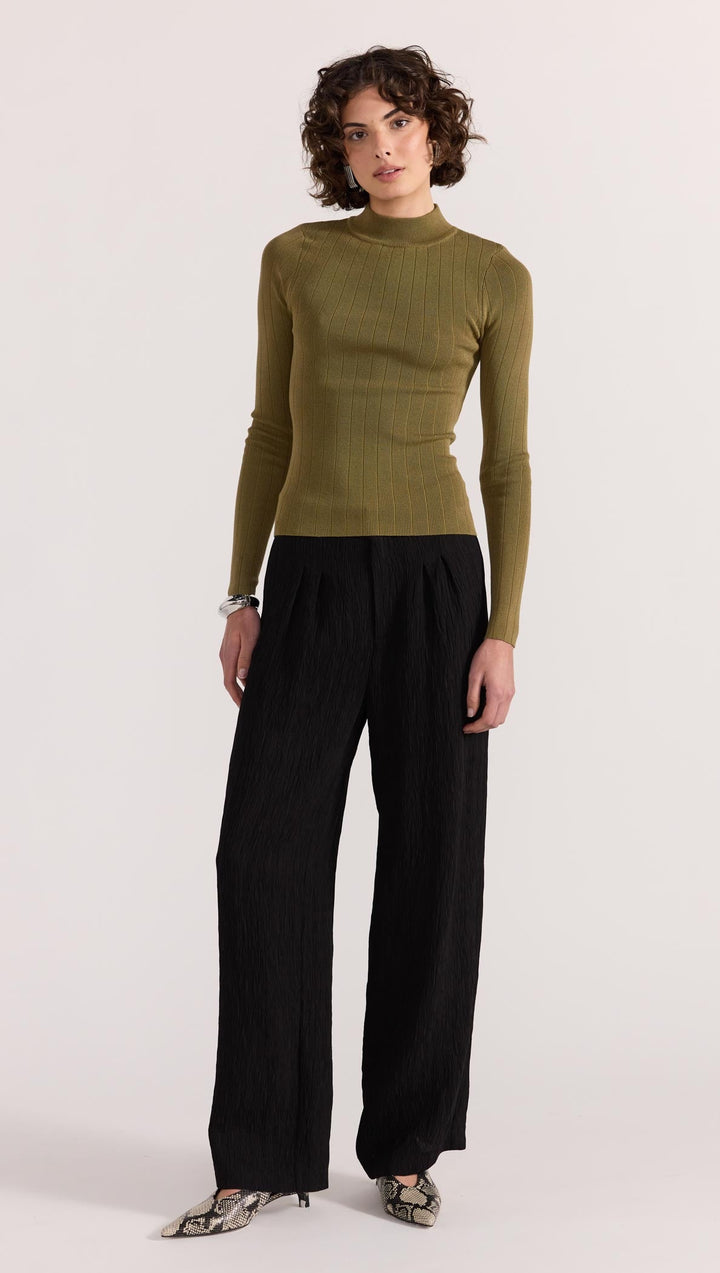 The Renee Rib Knit Top by Staple the Label is a timeless wardrobe essential. Featuring a fitted silhouette, and stretchy rib knit fabrication.  Available from www.thecollectivenz.com