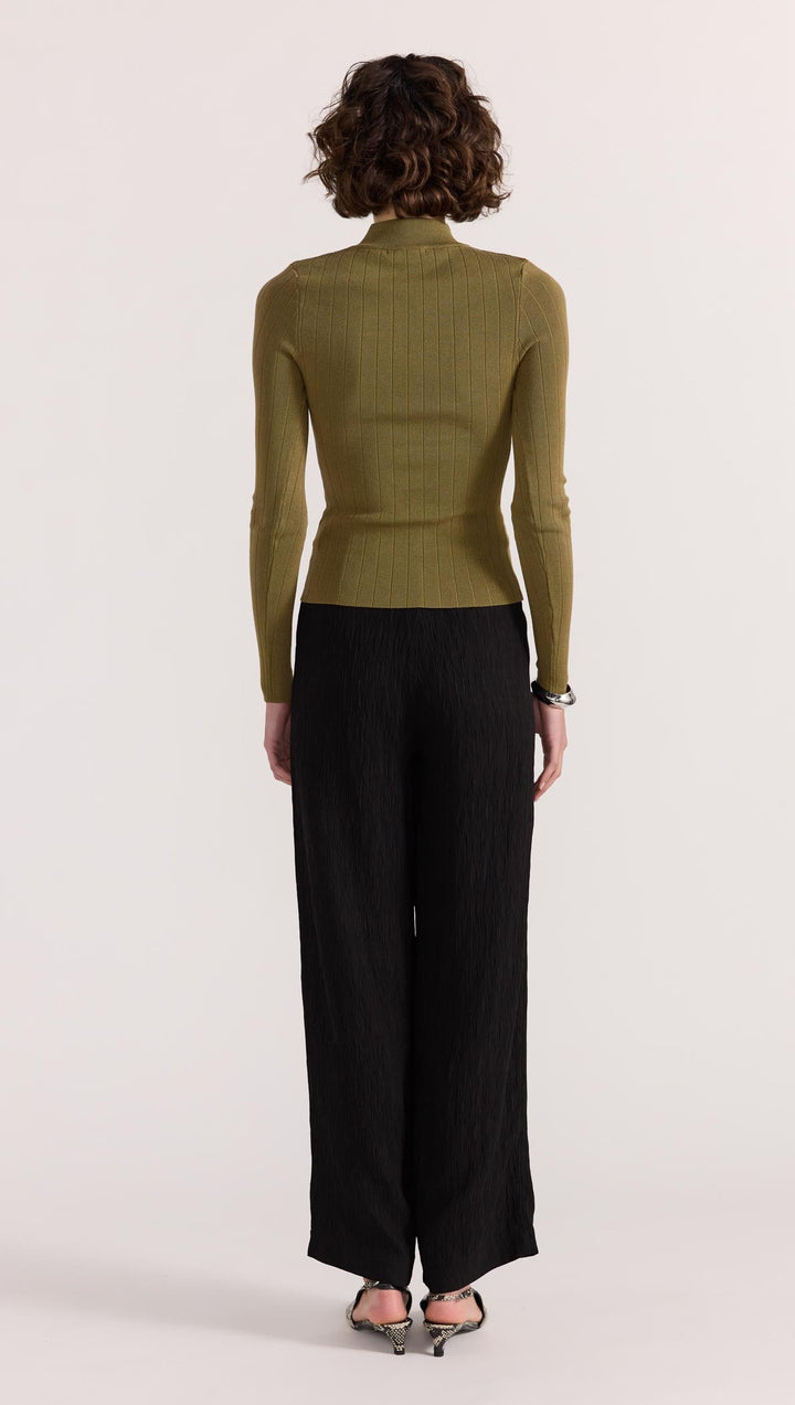 The Renee Rib Knit Top by Staple the Label is a timeless wardrobe essential. Featuring a fitted silhouette, and stretchy rib knit fabrication.  Available from www.thecollectivenz.com