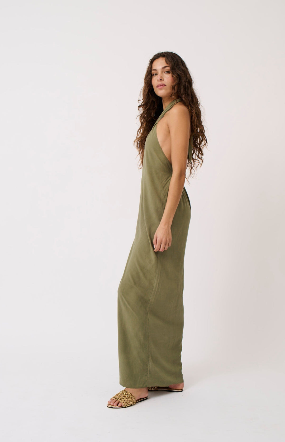 The Sabrina maxi dress features a halter-neck and elasticated band and the back for ease of wear, available from www.thecollectivenz.com