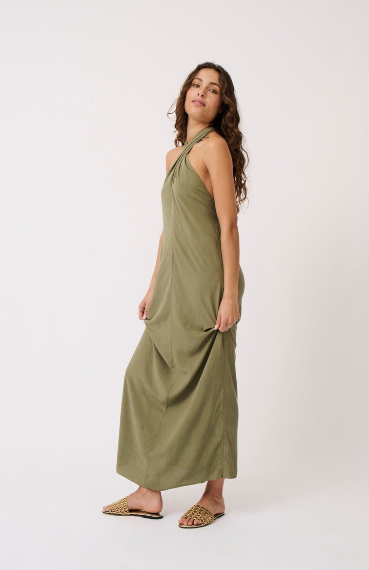 The Sabrina maxi dress features a halter-neck and elasticated band and the back for ease of wear, available from www.thecollectivenz.com