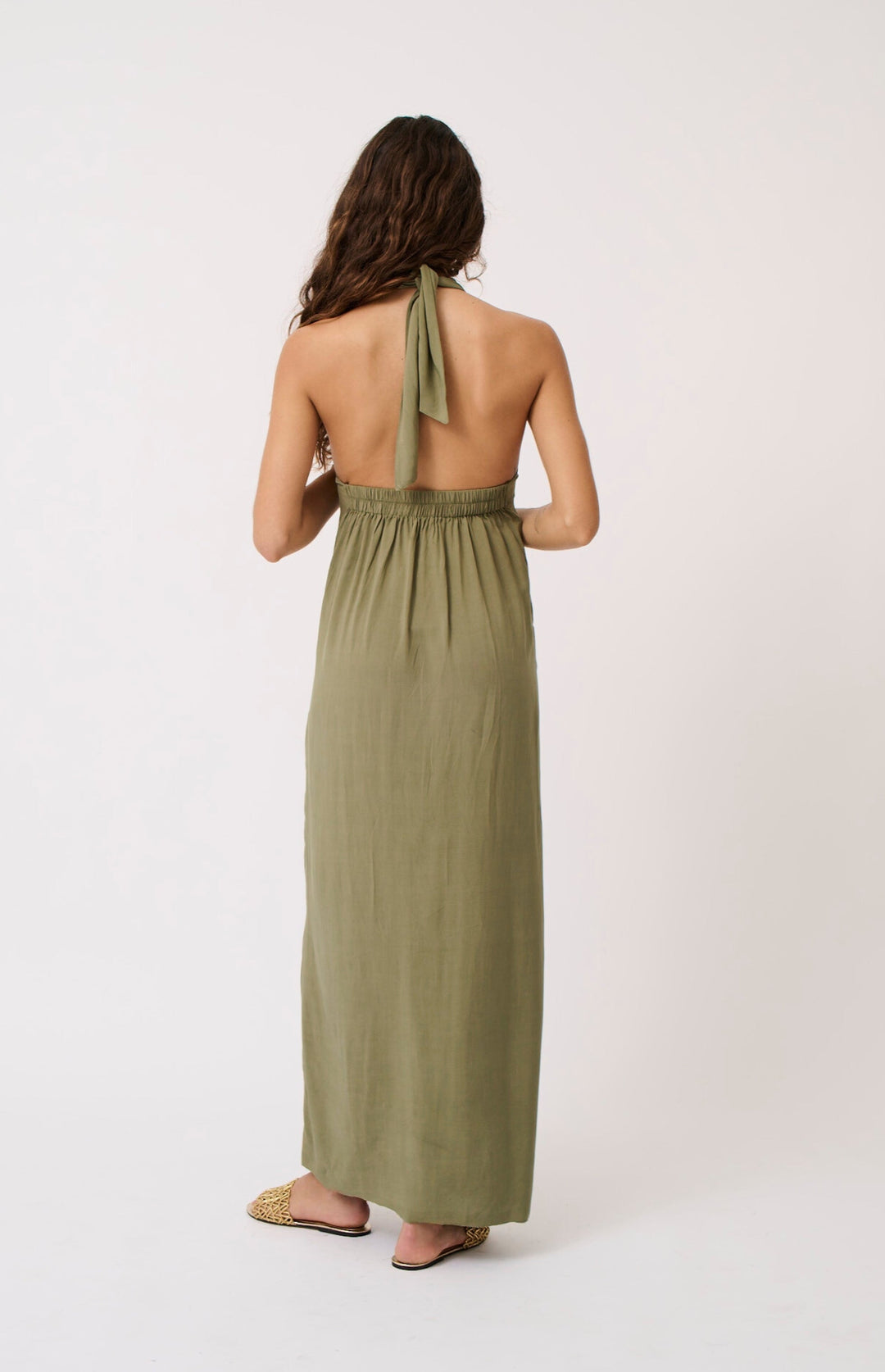 The Sabrina maxi dress features a halter-neck and elasticated band and the back for ease of wear, available from www.thecollectivenz.com
