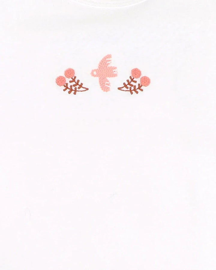 Decorative design with floral elements and a bird on a white background
