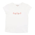 White t-shirt with pink text on a white background