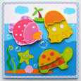 Colorful turtle-themed children's puzzle with sea creatures on a blue background
