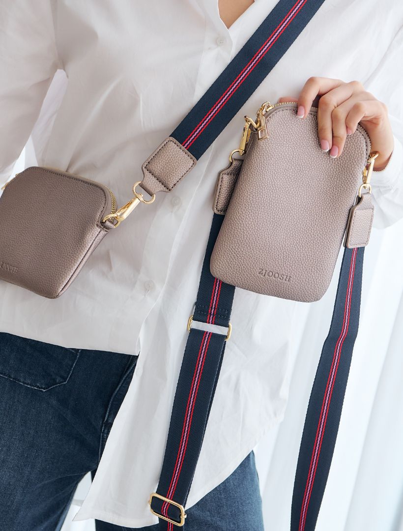 The Wanderer Cross Body Bag by Zjoosh is just the right size to carry a phone, lip gloss, cards and keys. With 4 internal card holders and an external zipper pocket on the back, she keeps all your easy to loose items safe. Available from www.thecollectivenz.com