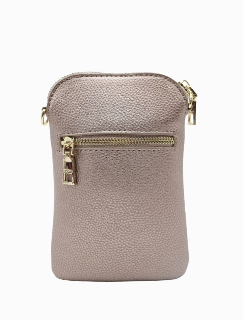 The Wanderer Cross Body Bag by Zjoosh is just the right size to carry a phone, lip gloss, cards and keys. With 4 internal card holders and an external zipper pocket on the back, she keeps all your easy to loose items safe. Available from www.thecollectivenz.com