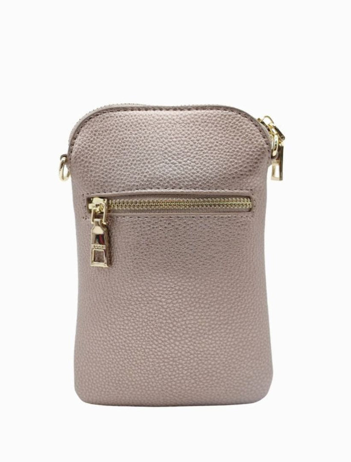 The Wanderer Cross Body Bag by Zjoosh is just the right size to carry a phone, lip gloss, cards and keys. With 4 internal card holders and an external zipper pocket on the back, she keeps all your easy to loose items safe. Available from www.thecollectivenz.com