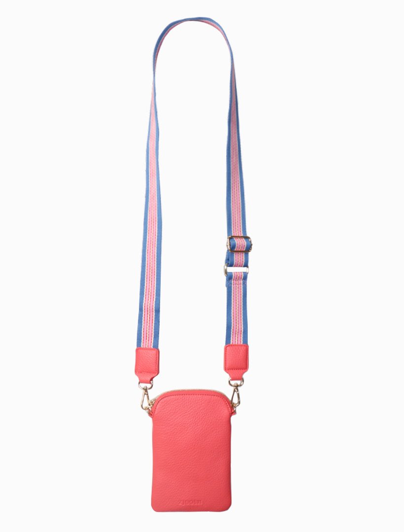 The Wanderer Cross Body Bag by Zjoosh is just the right size to carry a phone, lip gloss, cards and keys. With 4 internal card holders and an external zipper pocket on the back, she keeps all your easy to loose items safe. Available from www.thecollectivenz.com