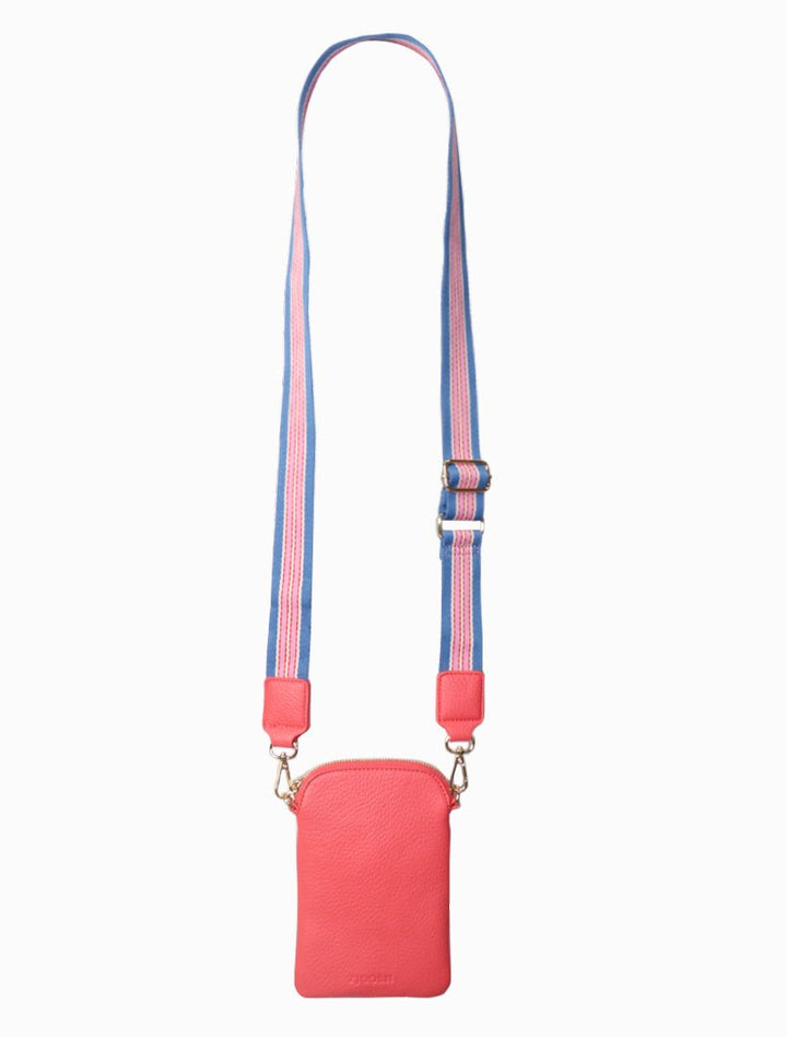 The Wanderer Cross Body Bag by Zjoosh is just the right size to carry a phone, lip gloss, cards and keys. With 4 internal card holders and an external zipper pocket on the back, she keeps all your easy to loose items safe. Available from www.thecollectivenz.com