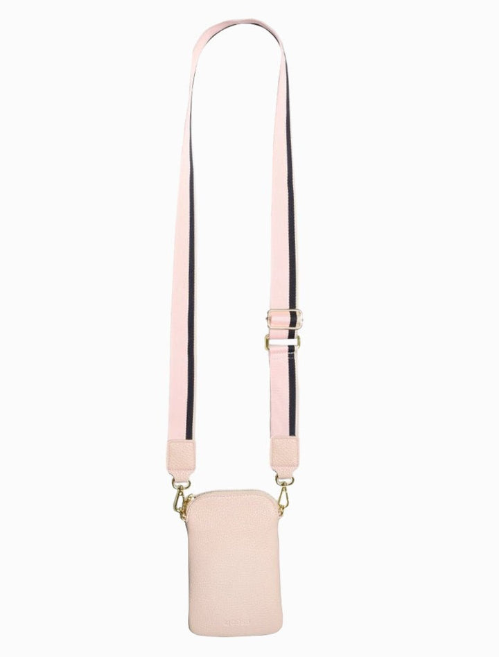 The Wanderer Cross Body Bag by Zjoosh is just the right size to carry a phone, lip gloss, cards and keys. With 4 internal card holders and an external zipper pocket on the back, she keeps all your easy to loose items safe. Available from www.thecollectivenz.com