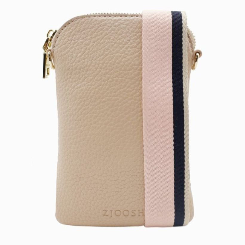 The Wanderer Cross Body Bag by Zjoosh is just the right size to carry a phone, lip gloss, cards and keys. With 4 internal card holders and an external zipper pocket on the back, she keeps all your easy to loose items safe. Available from www.thecollectivenz.com