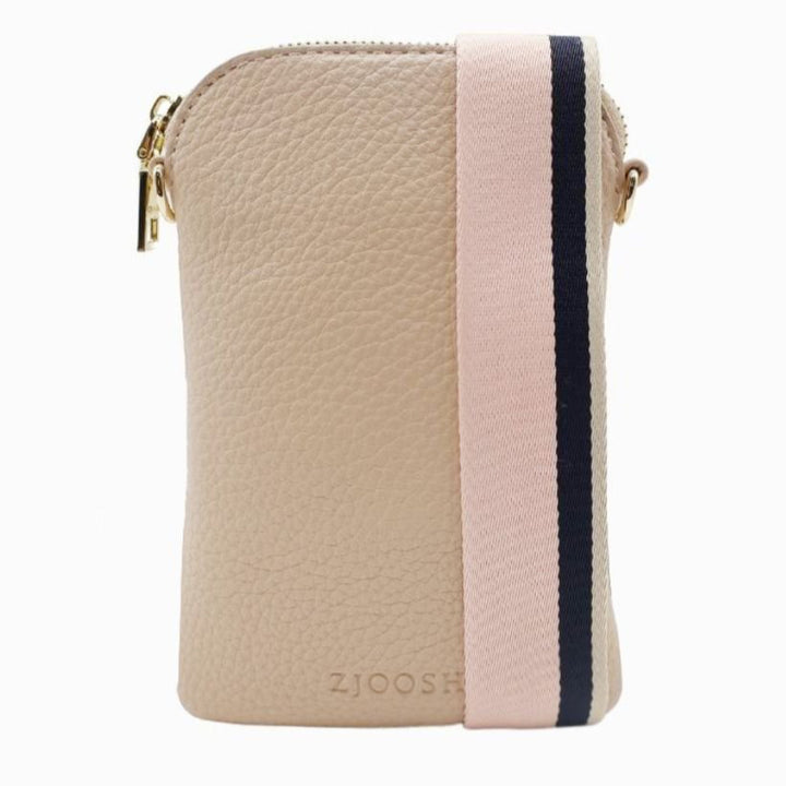 The Wanderer Cross Body Bag by Zjoosh is just the right size to carry a phone, lip gloss, cards and keys. With 4 internal card holders and an external zipper pocket on the back, she keeps all your easy to loose items safe. Available from www.thecollectivenz.com