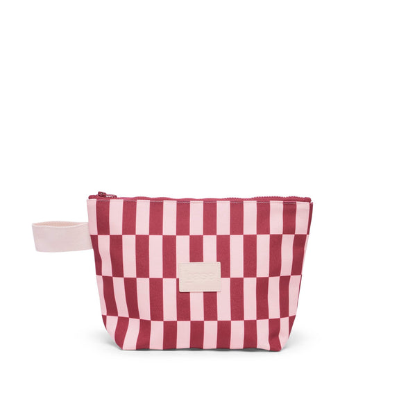 Pink and red striped bag with a white zipper on a white background