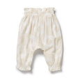 Wilson & Frenchy Beige baby pants with a soft texture on a white background
