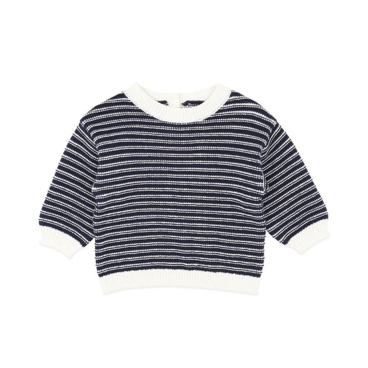Navy and white striped sweater with a white collar on a white background