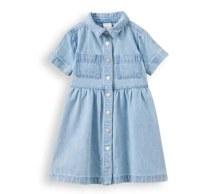 A light blue denim short-sleeve dress for toddlers, featuring a button-down front, pointed collar, and two front patch pockets, shown against a plain white background.