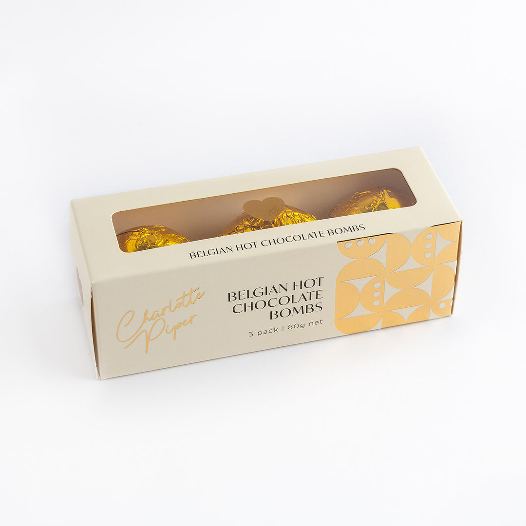 Box of Belgian Hot Chocolate Bombs with a clear window on a white background
