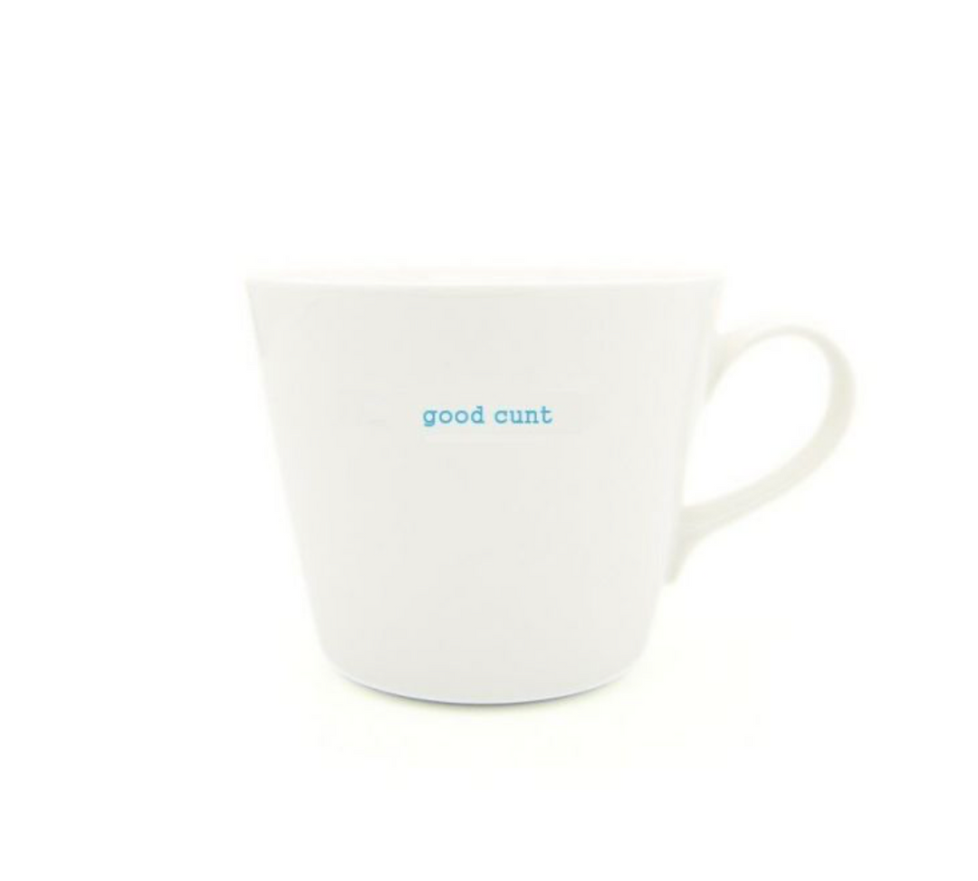 White mug with blue text on a white background