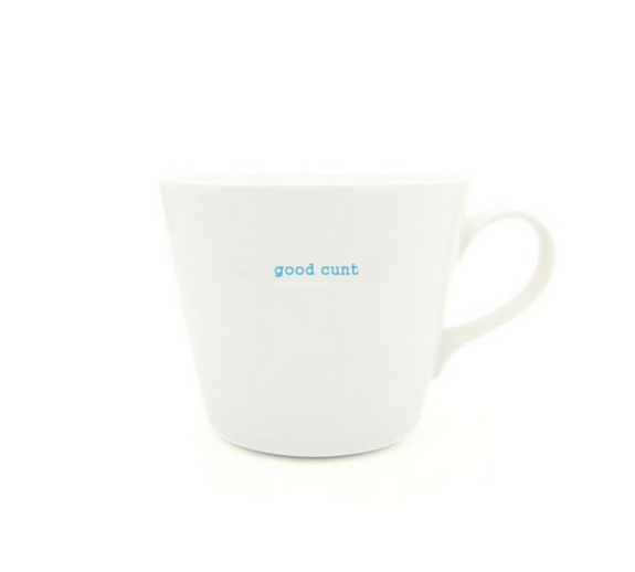 White mug with blue text on a white background