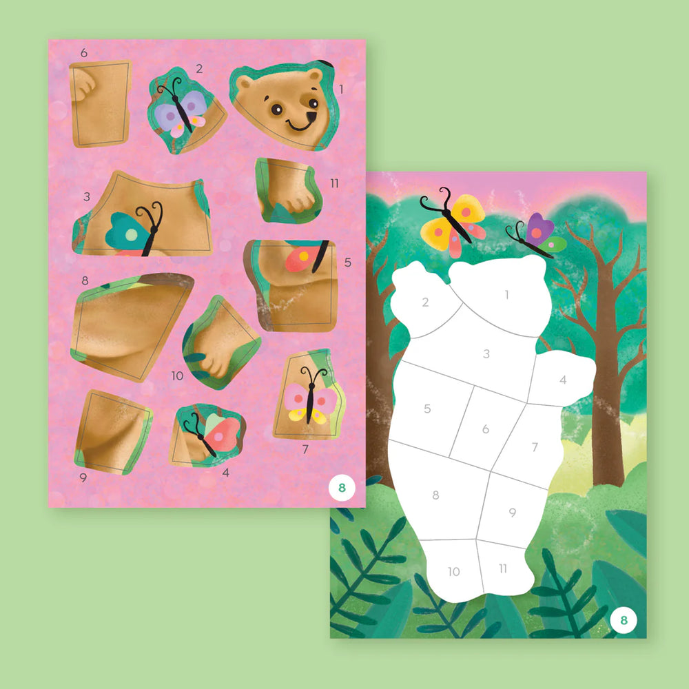 Children's puzzle with bear and butterfly pieces on a pink background, surrounded by a forest illustration.