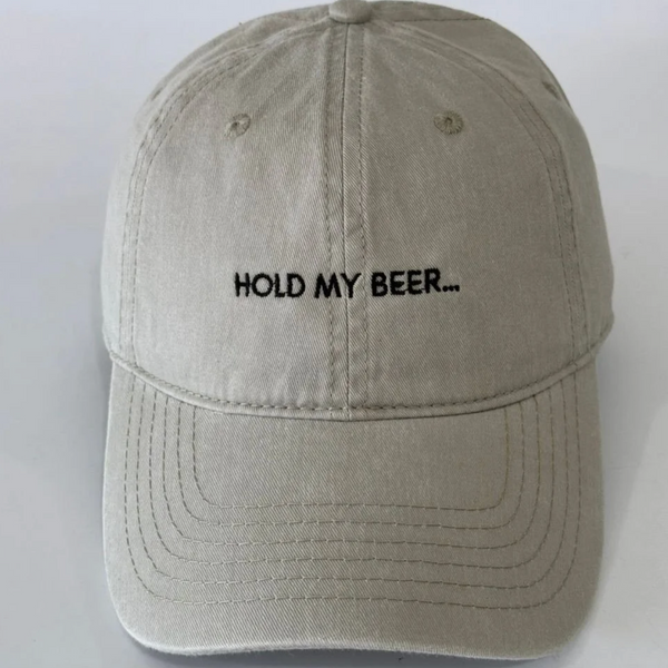 Beige cap with 'Hold My Beer...' text on a white background
