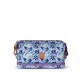 Floral patterned bag with a visible brand logo on a white background