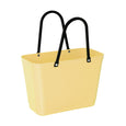 Yellow tote bag with black handles on a white background