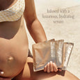 Pregnant woman holding Pure Mama hydration masks with text about luxurious hydration.