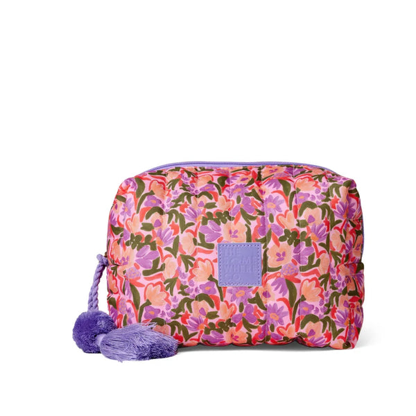 Floral patterned pouch with purple accents on a white background