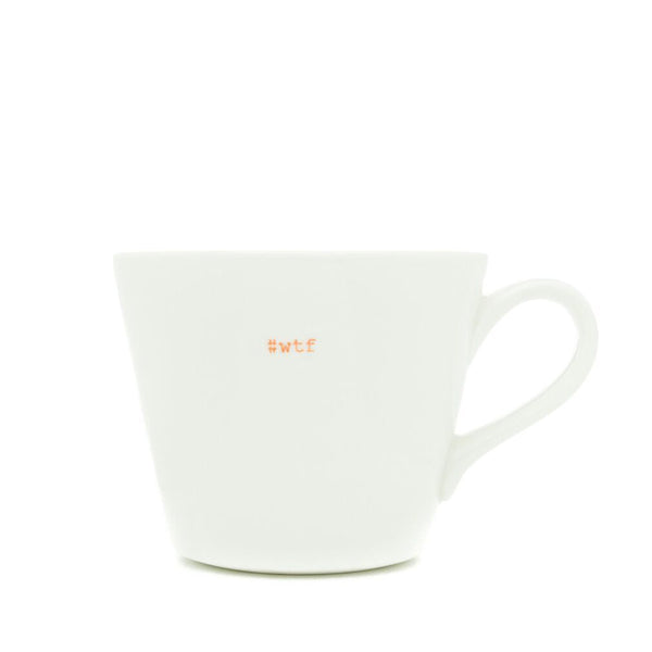 White mug with 'WTF' printed on it against a white background