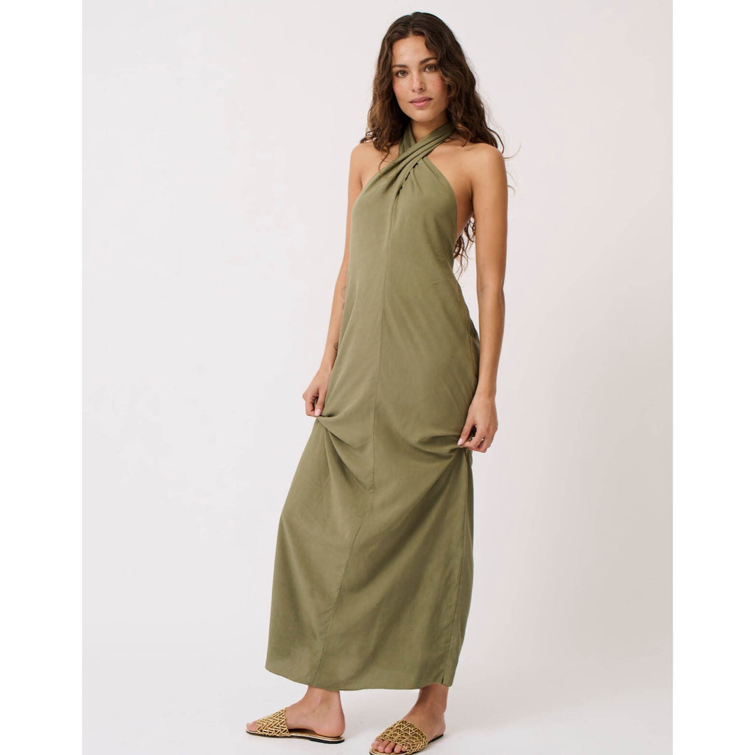 The Sabrina maxi dress features a halter-neck and elasticated band and the back for ease of wear, available from www.thecollectivenz.com