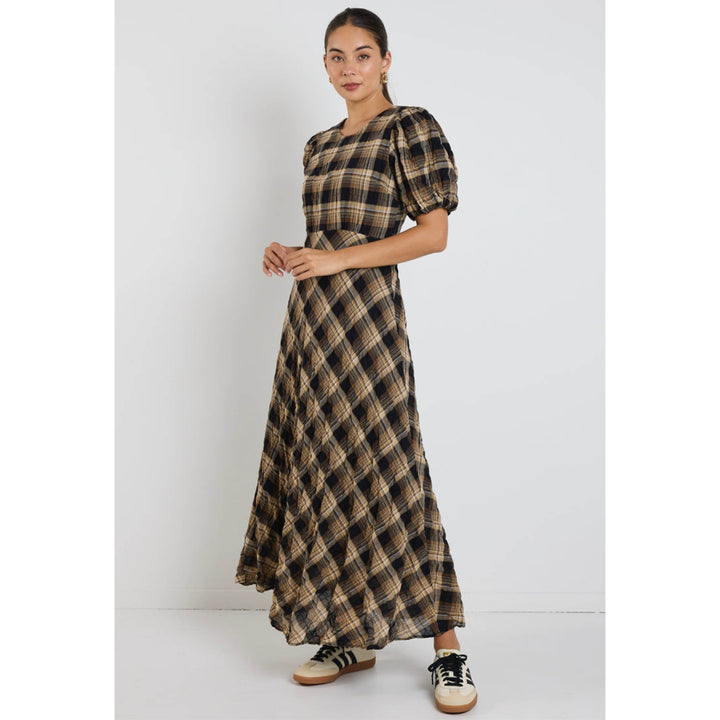 The encore caramel check dress brings easy charm and a little drama to your wardrobe.  Available from www.thecollectivenz.com