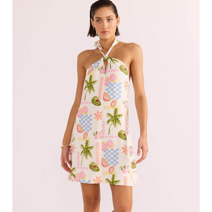 Step out in style this season, with the new-in Gracie Halter Neck Mini Dress. Featuring fruit &amp; beach motifs throughout, in an array of vibrant hues, available from www.thecollectivenz.com