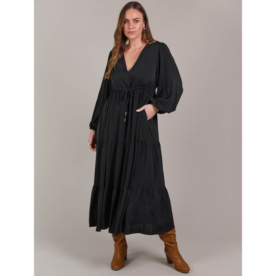 The Elsie Maxi Dress is the ultimate expression of effortless sophistication. Its flattering V-neck flows seamlessly down to an adjustable drawstring, designed to enhance and define your figure. Available from www.thecollectivenz.com