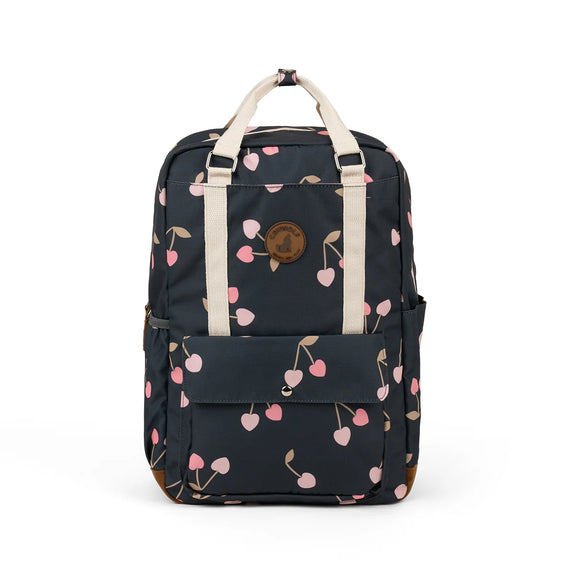 Navy blue backpack with pink cherry pattern on a white background