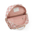 Pink checkered backpack with visible brand label on a white background