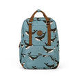 Backpack with whale pattern on a blue background