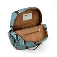 Open backpack with blue pattern and brown interior on a white background