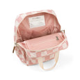 Pink checkered bag with a visible brand label on a white background