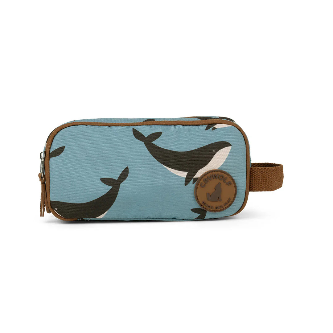 Toiletry bag with whale pattern on a light blue background