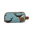 Toiletry bag with whale pattern on a light blue background