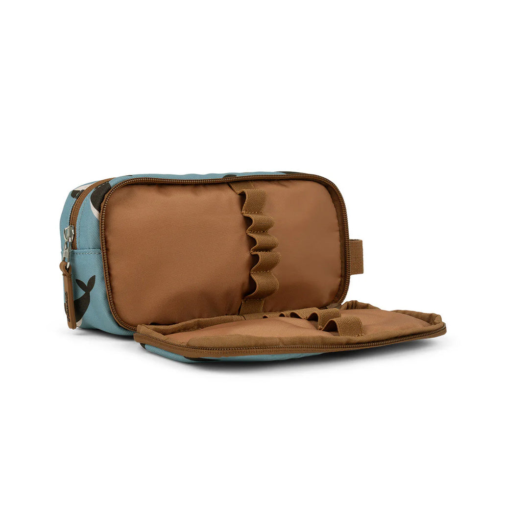 Open toiletry bag with brown interior and blue exterior on a white background