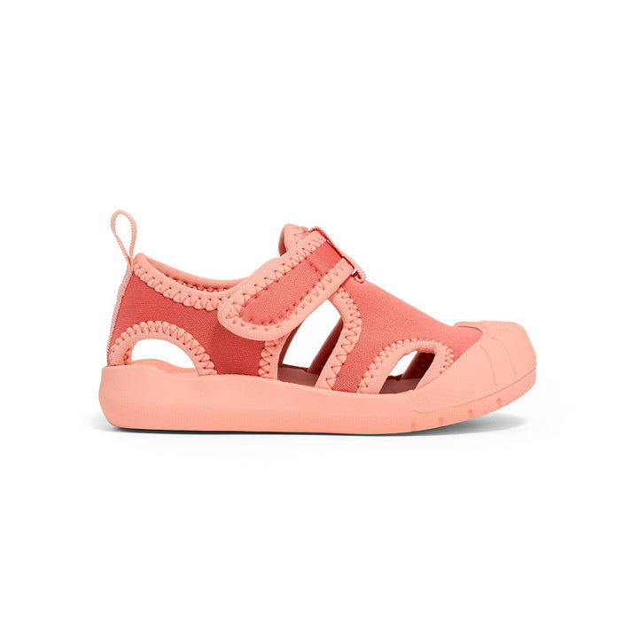 Coral crywolf sandal on a white background