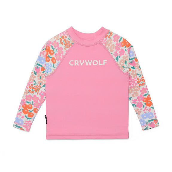 Pink long-sleeve rash vest  with floral sleeves and 'Crywolf' text on a white background